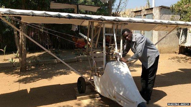 George Mel with his light aircraft