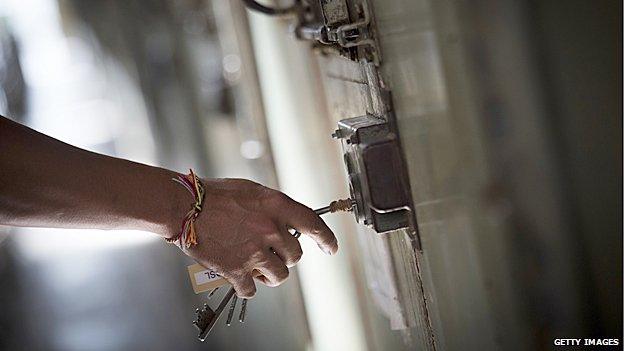 Door being locked in a French prison