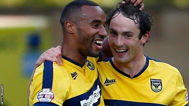 Tyrone Barnett (l) with Oxford United team-mate Danny Hylton