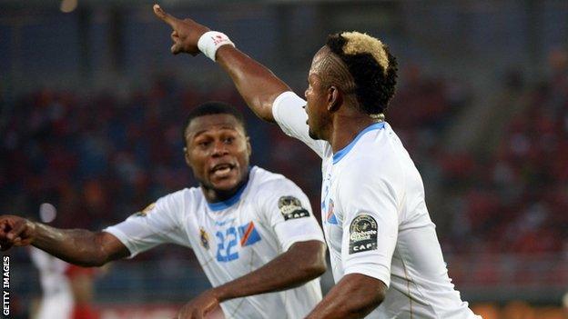 DR Congo's Joel Kimwaki celebrates after scoring against in their Nations Cup quarter-final