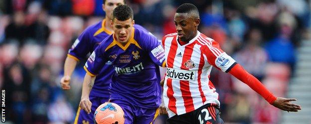 Marvin Johnson (left) in action for Kidderminster Harriers