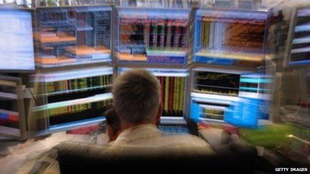 Man at trading desk