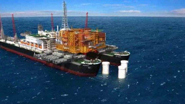 Oil platform lifted by two ships