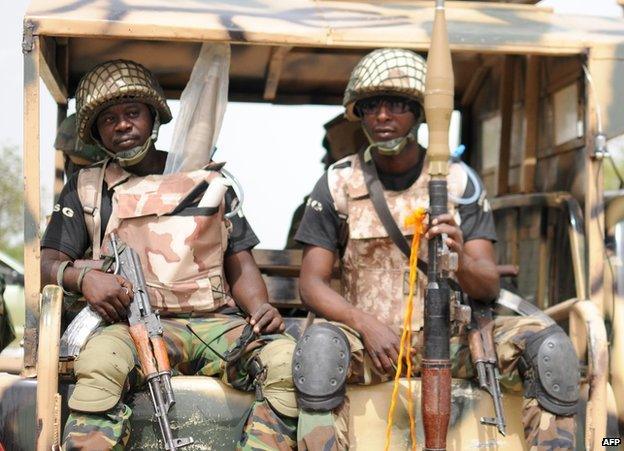 Nigerian soldiers ready for a patrol in the north of Borno state