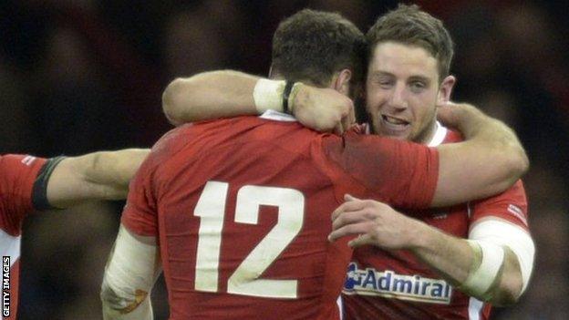 Dan Biggar, Jamie Roberts and Alex Cuthbert celebrate in 2013 against England