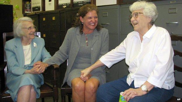 Attorney Alice Lee, left, Monroe County Circuit Judge-elect Dawn Hare, centre, and her sister, Pulitzer-winning author Harper Lee, right.