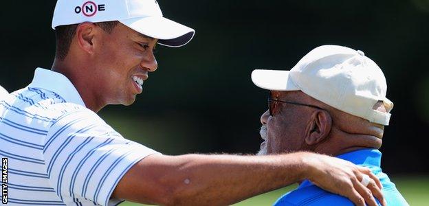 Charlie Sifford with Tiger Woods