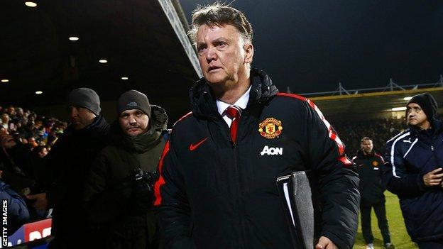 Manchester United manager Louis van Gaal takes his seat at the Abbey Stadium