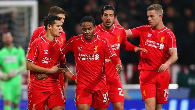 Liverpool celebrate Raheem Sterling's goal