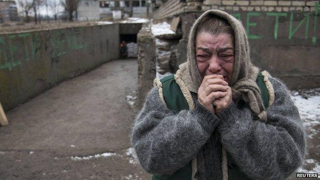 An elderly woman cries in Debaltseve, Donetsk region. Photo: 4 February 2015