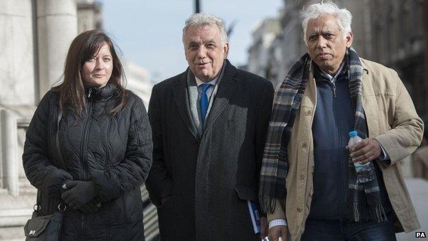 Petitioners Angela Moffat Andy Erlam and Azmal Hussein (right) outside the Royal Courts of Justice