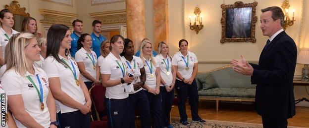 Prime Minister David Cameron and the England women's rugby team