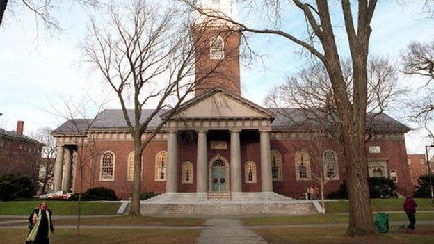 People walk around the Harvard University''s main campus December 19, 2000 in Cambridge, MA