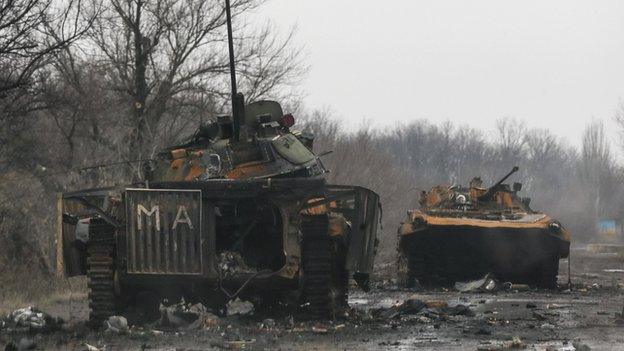 Armoured vehicles destroyed in fighting between Ukrainian government forces and separatists in Vuhlehirsk 6 February 2015.