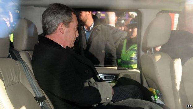 Nigel Farage sitting in his car