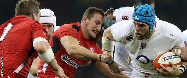 Sam Warburton attempts to bring down James Haskell