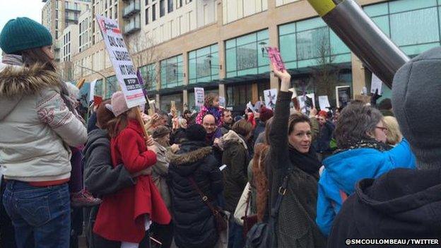 people held books in the air during the demonstration