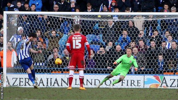 Sheffield Wednesday's Will Keane equalises from the penalty spot against Cardiff