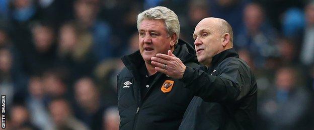 Hull boss Steve Bruce (left) was joined by new assistant manager Mike Phelan in the dug-out at Man City for the first time