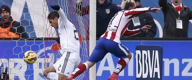 Antoine Griezmann scores the third goal for Atletico Madrid