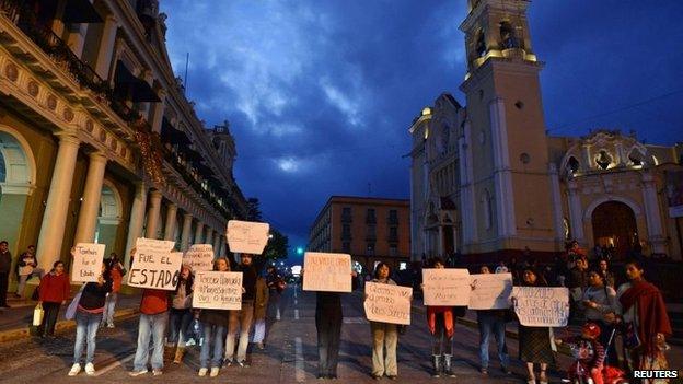 Journalists hold signs demanding the safe return of colleague Moises Sanchez during a protest in Xalapa. 08/01/2015