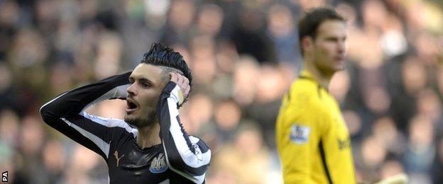 Newcastle playmaker Remy Cabella (left) reacts after Stoke keeper Asmir Begovic saves a header from him