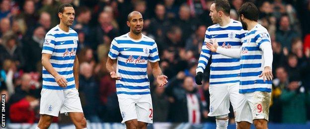 QPR players react to conceding a goal