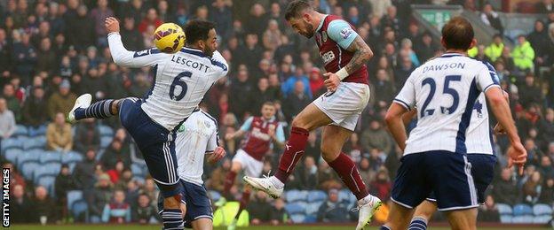 Danny Ings heads in Burnley's second goal against West Brom