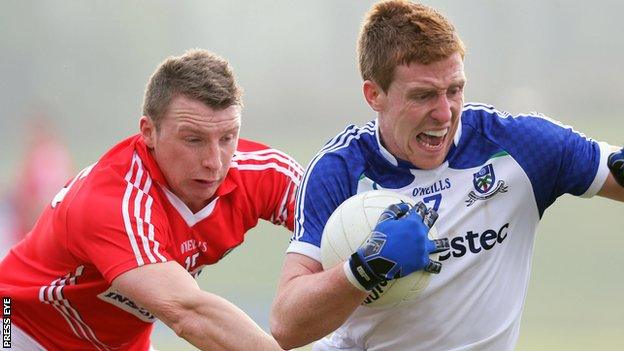 Brian Hurley of Cork challenges Monaghan's Kieran Duffy