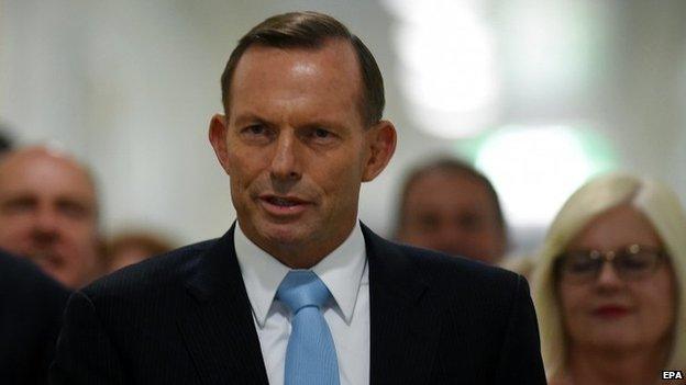 Australian Prime Minister Tony Abbott arrives for a special Liberal party room meeting at Parliament House in Canberra, Australia, on 09 February 2015