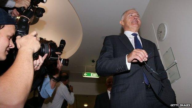 Minister for Communications Malcolm Turnbull leaves the party room at Parliament House on 09 February 2015 in Canberra, Australia