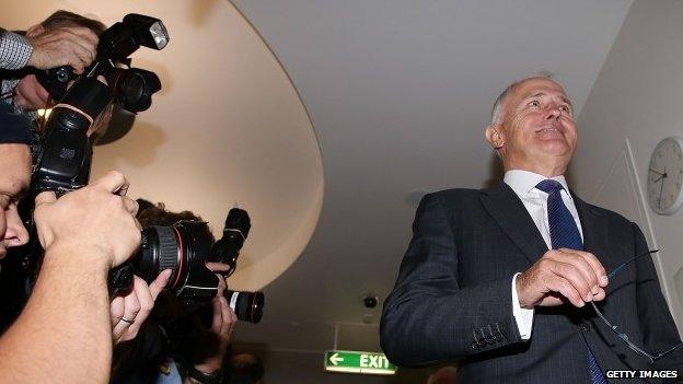 Minister for Communications Malcolm Turnbull leaves the party room at Parliament House in Canberra (09 February 2015)