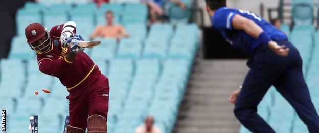 West Indies' Marlon Samuels is bowled by Steven Finn