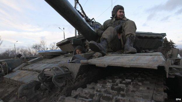 Ukrainian servicemen rest on a tank in Artyomovsk of Donetsk area, Ukraine, 08 February 2015