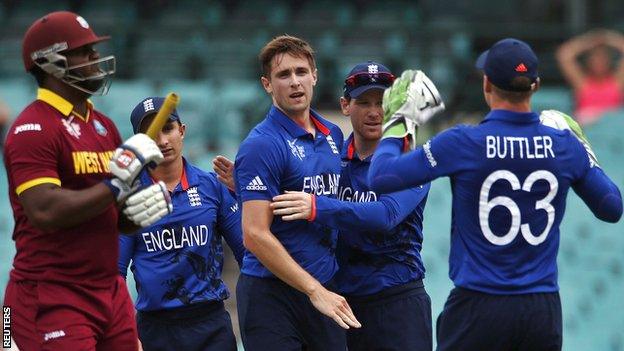 England celebrate after Chris Woakes (centre) dismisses West Indies' Dwayne Smith