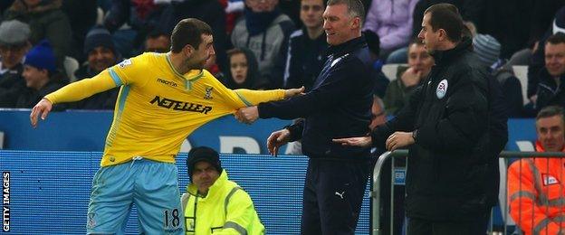 Pearson grabs McArthur's shirt after their touchline tangle