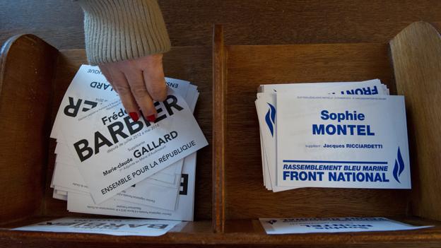 Hand reaches out for "Barbier" election paper in Doubs by-election in France