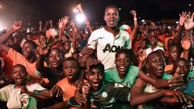 Ivory Coast fans celebrate winning the Africa Cup of Nations in the capital of Abidjan