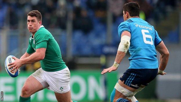 Ian Keatley attempts to burst away from Alessandro Zanni in Saturday's game in the Stadio Olimpico