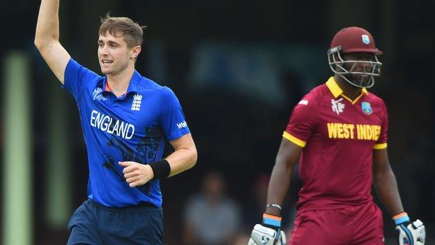 England's Chris Woakes celebrates a wicket