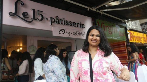 Pooja Dhingra in front of one of her three shops