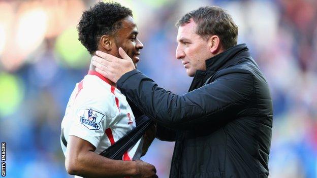 Brendan Rodgers (right) embraces Raheem Sterling