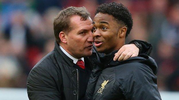 Brendan Rodgers (left) embraces Raheem Sterling