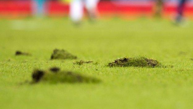 Hampden Park's pitch cut up badly