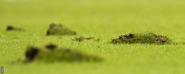 Hampden Park's pitch cut up badly