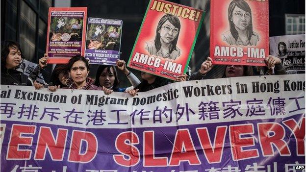 A group of protesters gather outside the courthouse in support of Indonesian former maid Erwiana Sulistyaningsih in Hong Kong on 10 February 2015.