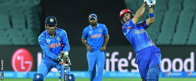 Afghanistan captain Mohammad Nabi is bowled