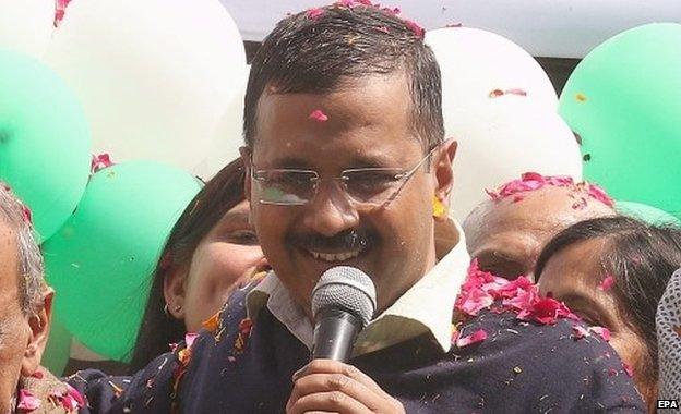 Aam Aadmi Party (AAP) leader Arvind Kejriwal addresses his supporters outside their party office in New Delhi, India 10 February 2015