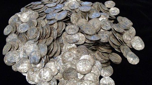 A pile of 697 coins