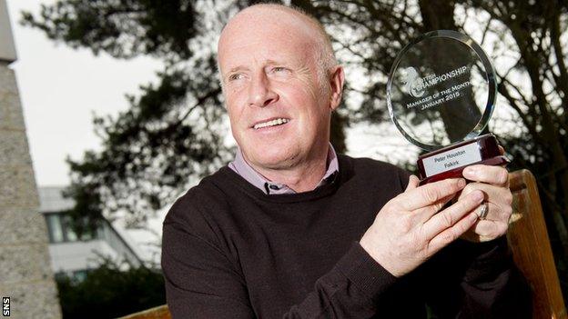 Falkirk manager Peter Houston with his manager of the month award